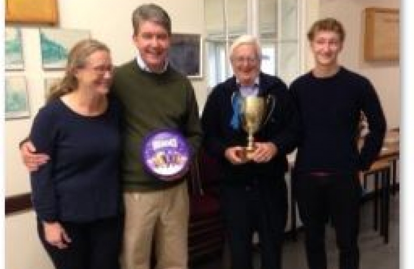 Team 'Folly' receive the winners cup