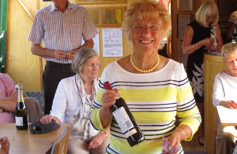 Melva (Hon Secretary) thrilled with her raffle prize